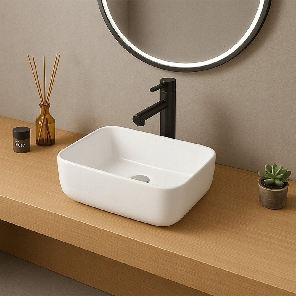 Owalna umywalka z błyszczącej białej ceramiki 37 x 25,5 cm – nowoczesny design