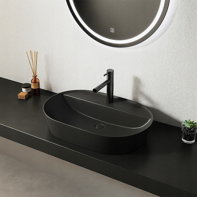 Owalna umywalka z czarnej ceramiki z otworami, 60 cm